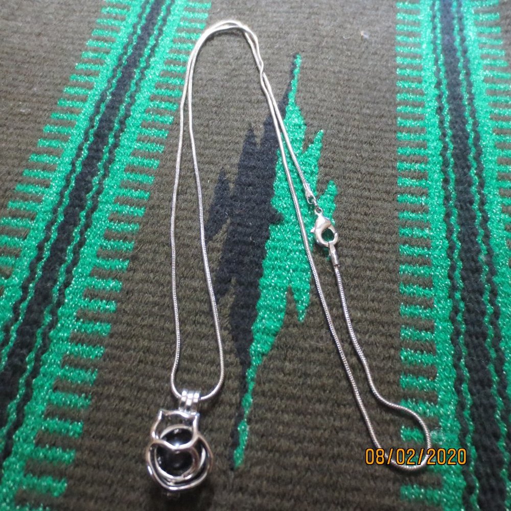 Cat cage pendant necklace